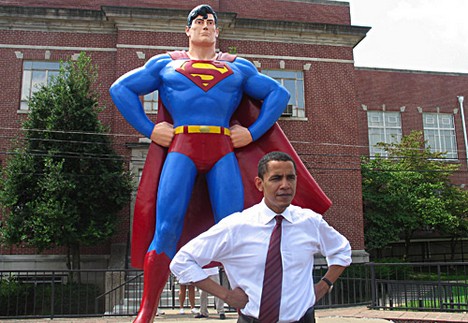 Barack Obama pretending that he is Superman!