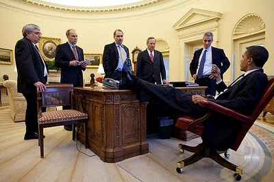 Obama with his feet on his desk