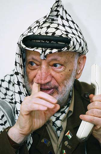 Yasser Arafat picks his nose